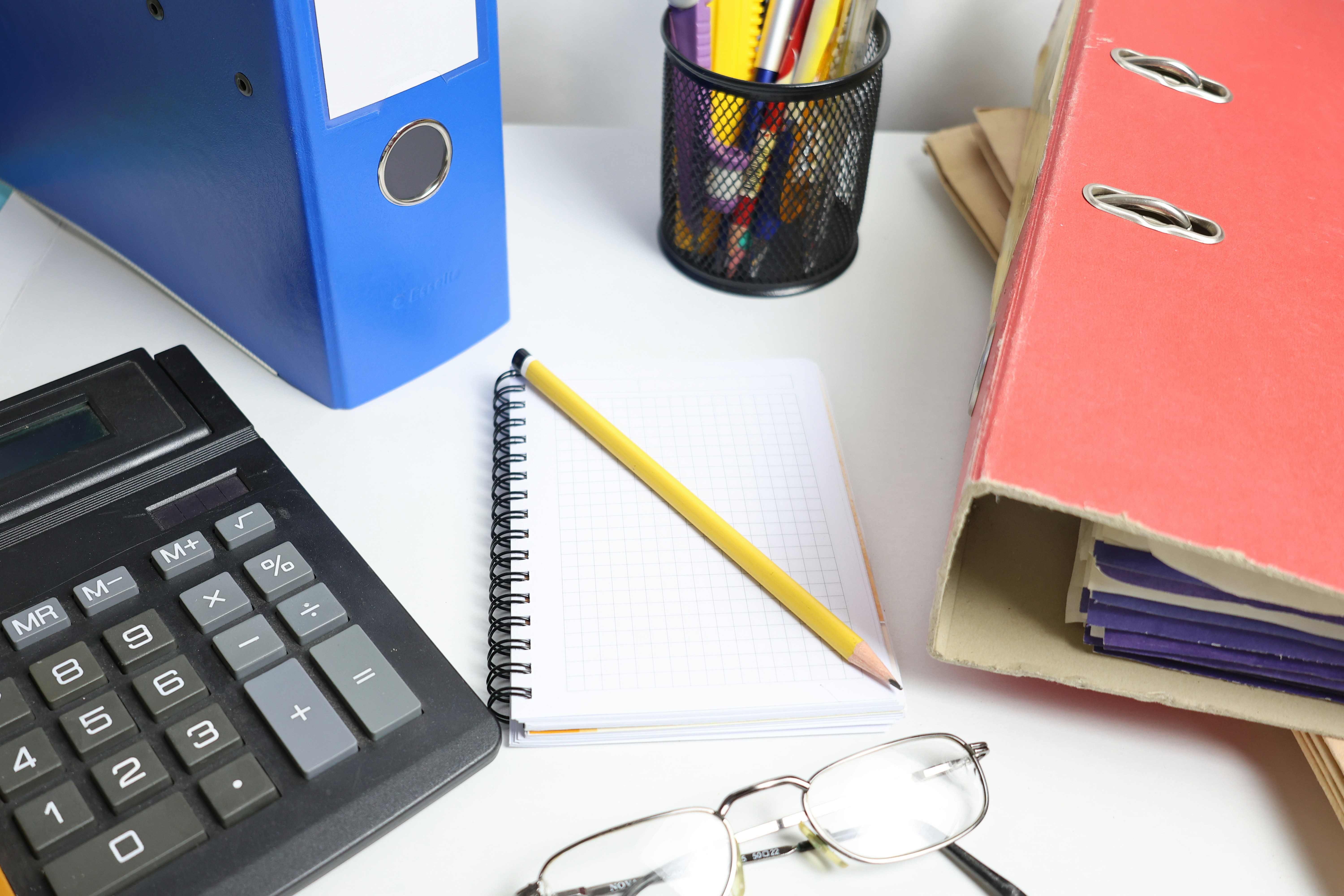 Grid notebook paper, binders, and office supplies