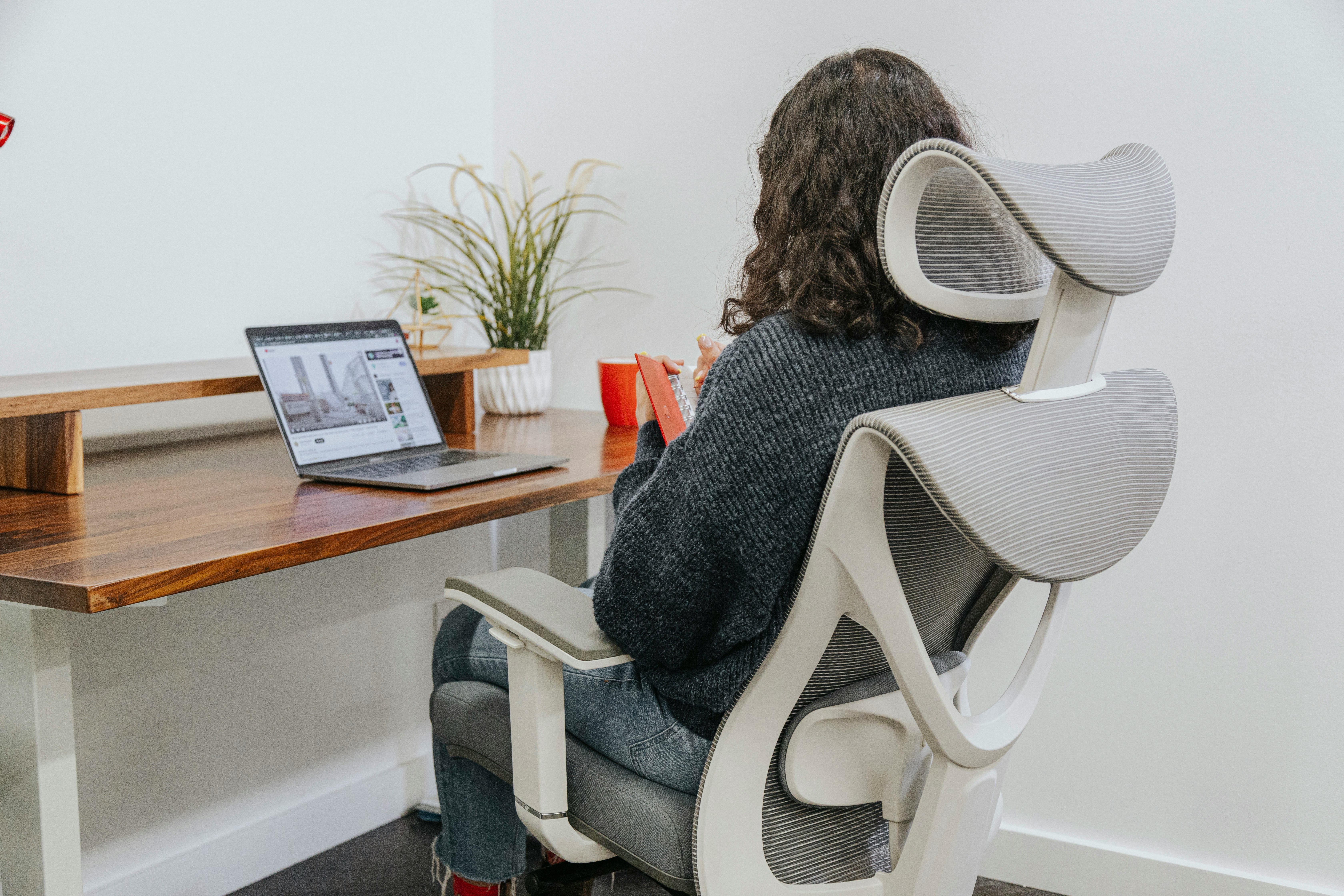 Woman in ergonomic chair