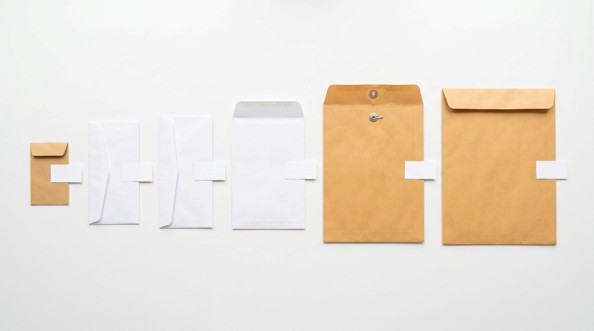 Common envelope sizes for bulk office ordering arranged from coin envelope to #10 business envelope to 10 x 13 catalog envelope